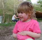 Liralyn sitting in the dirt