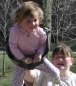 Liralyn on a swing.